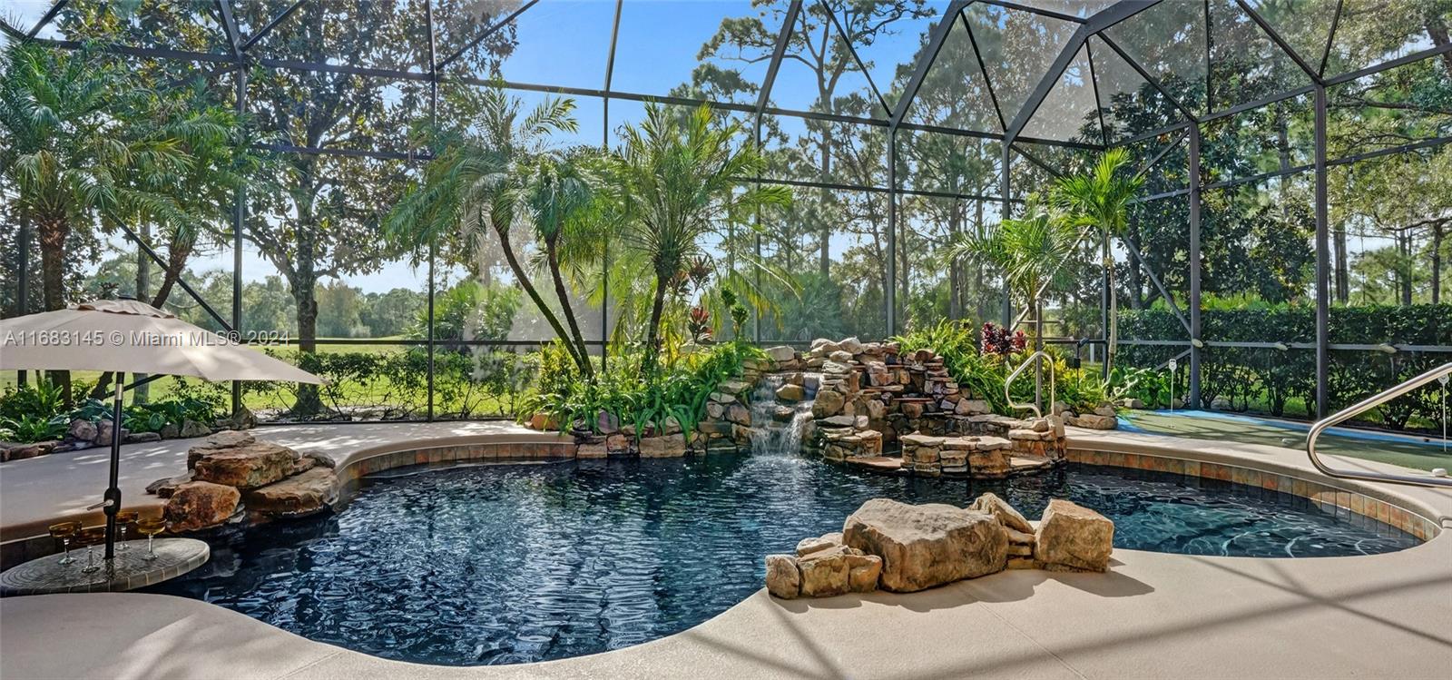 a view of a backyard with sitting area