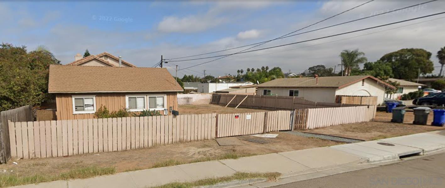 a front view of a house with a garage