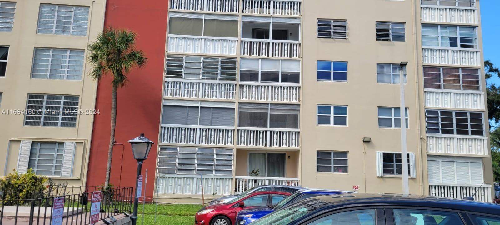 a front view of a building with windows