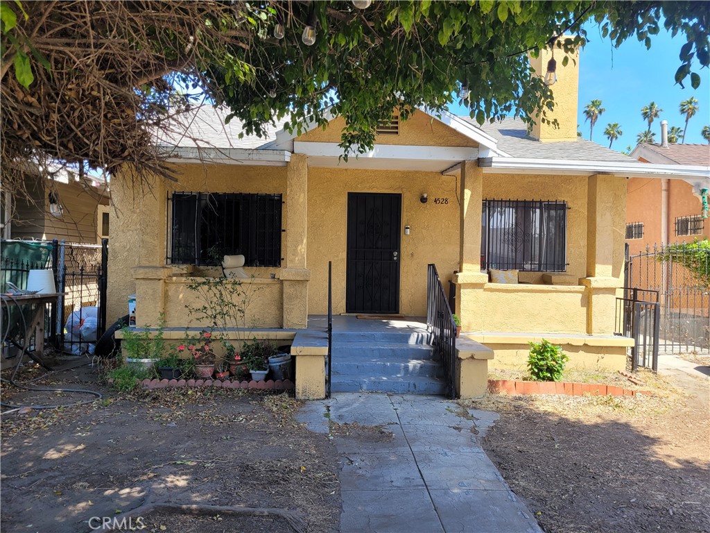 a front view of a house with a porch