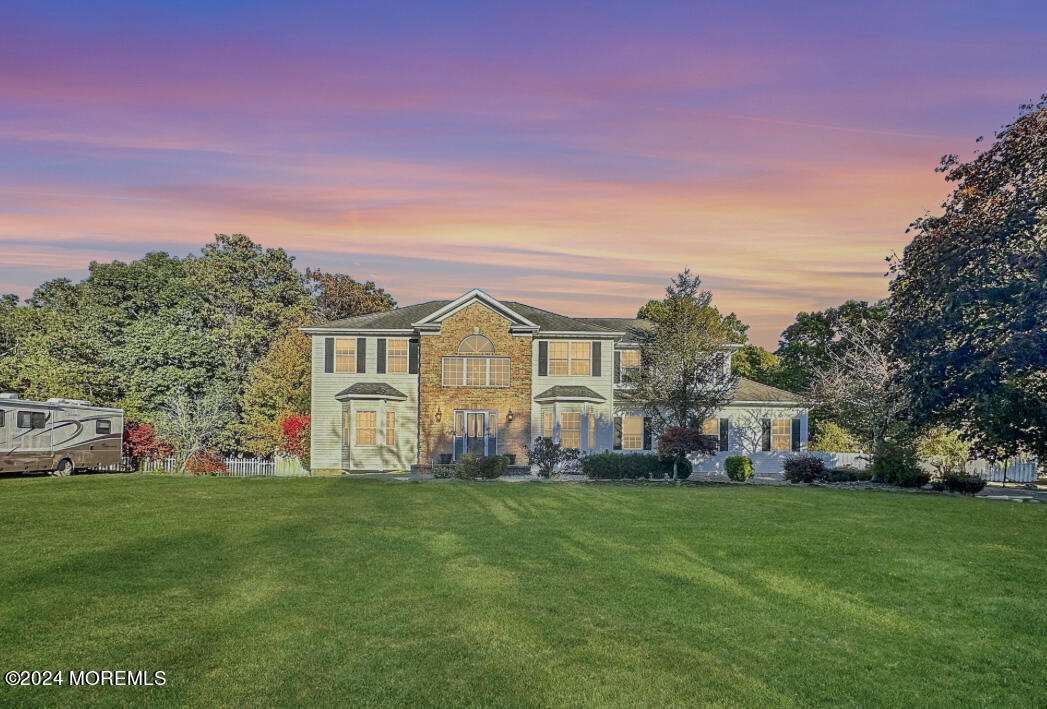 a view of a house with a big yard