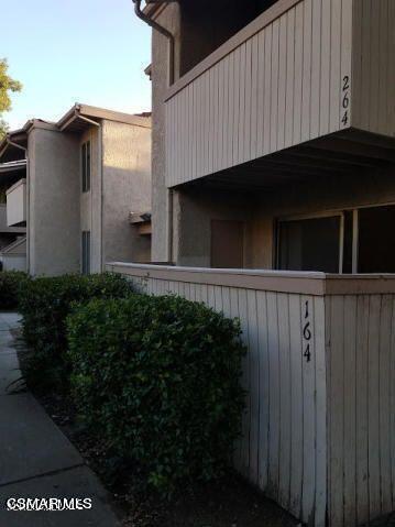 a view of a back yard of the house