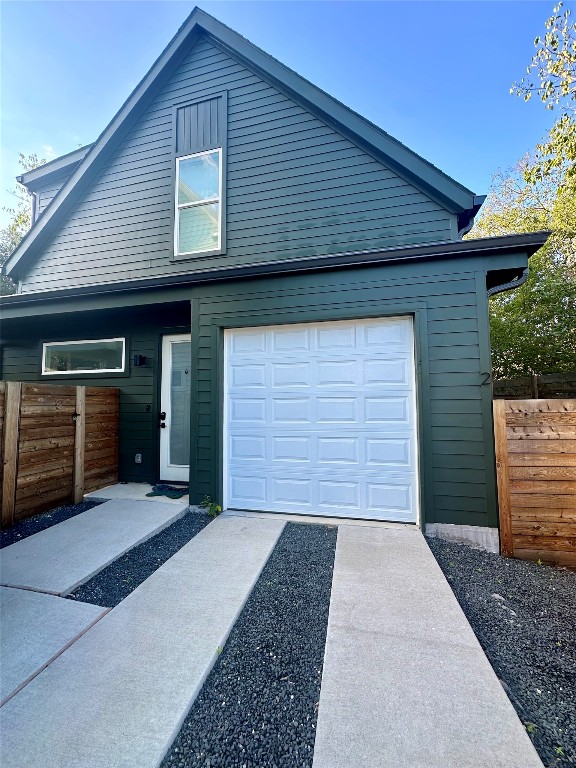 Front of home with an enclosed garage