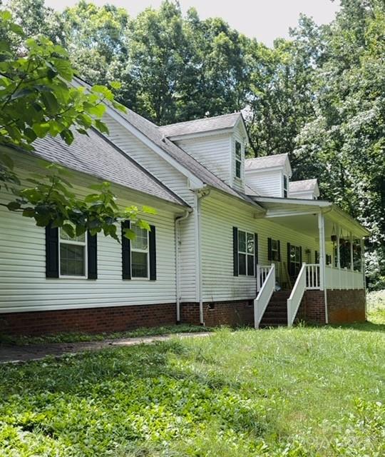 a front view of house with yard