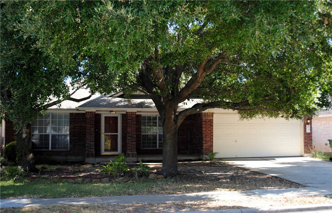 a front view of house with yard