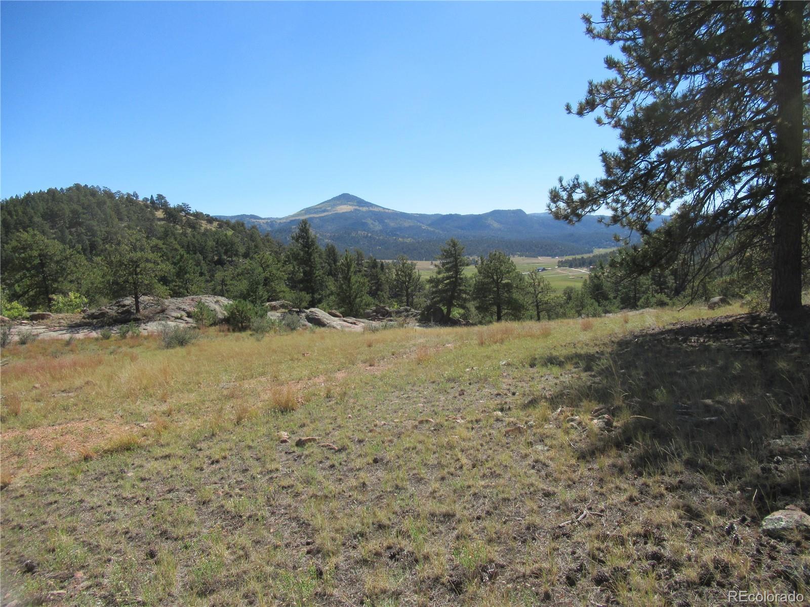 a view of an outdoor space with mountain view