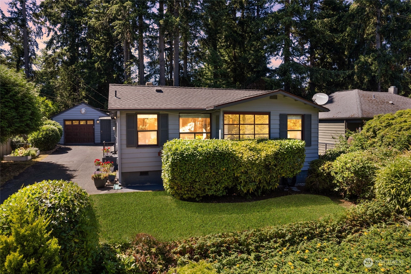 front view of a house with a garden