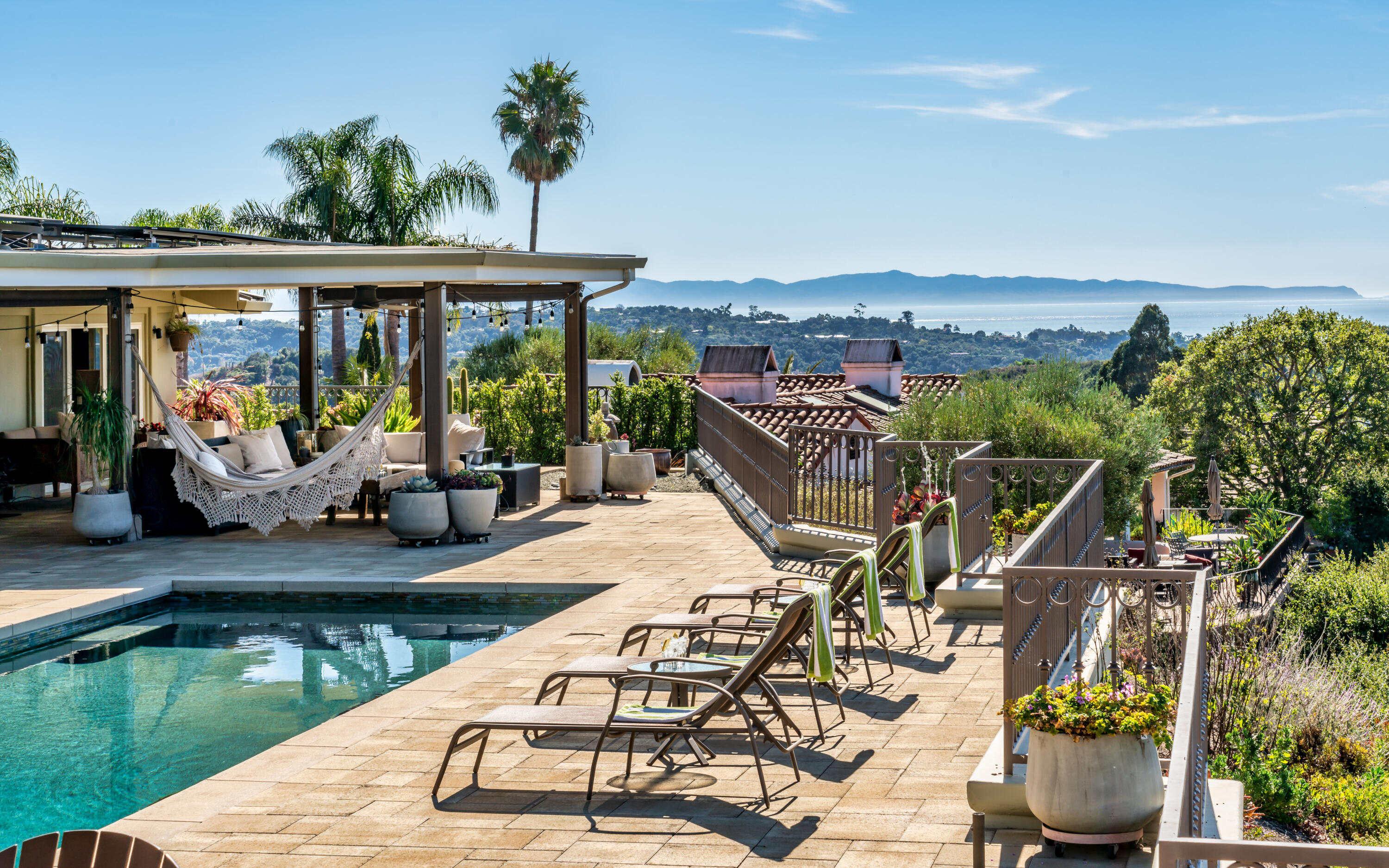 a view of a swimming pool with a patio