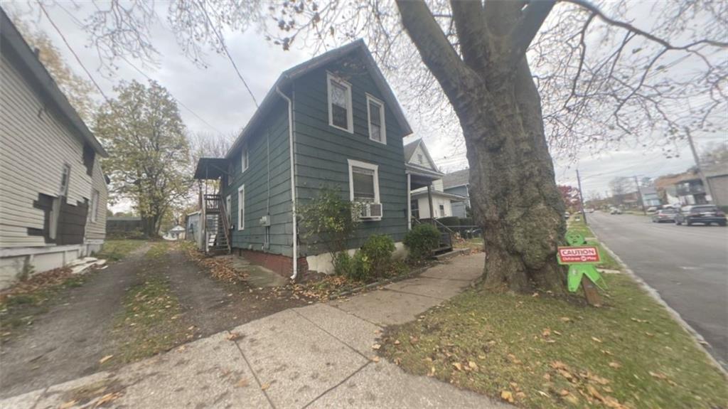 a view of a yard in front of a house