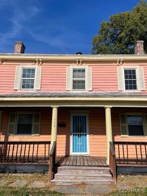 a view of a house with a balcony