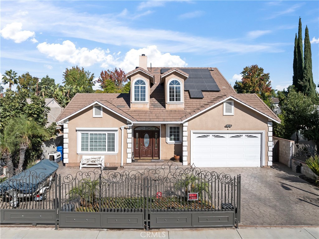 a front view of a house with a garage