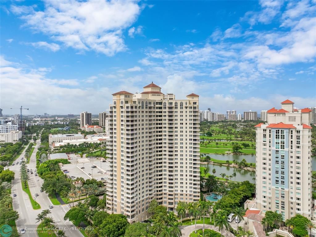 a view of a city with tall buildings