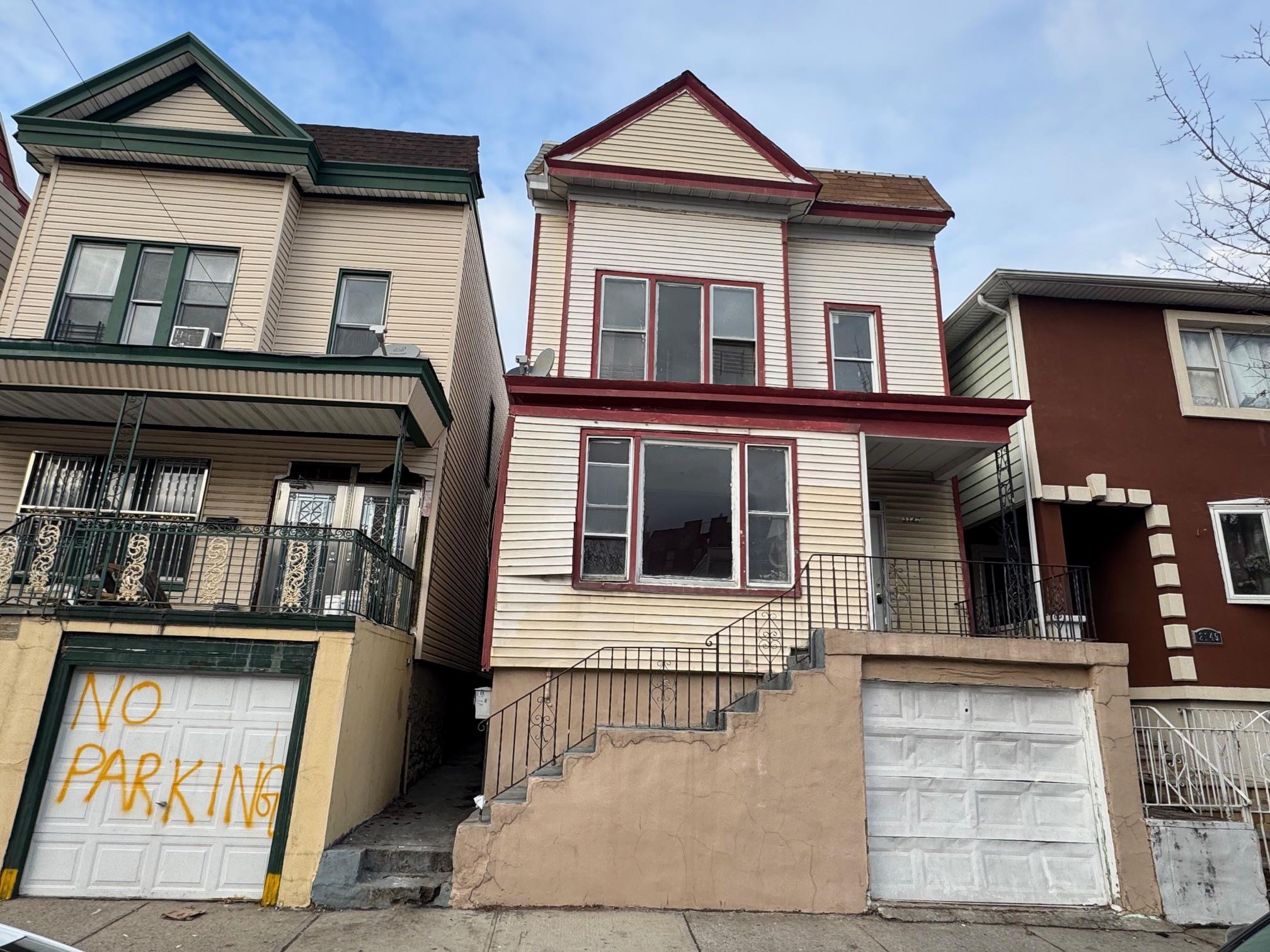 Multi unit property with a garage and a balcony