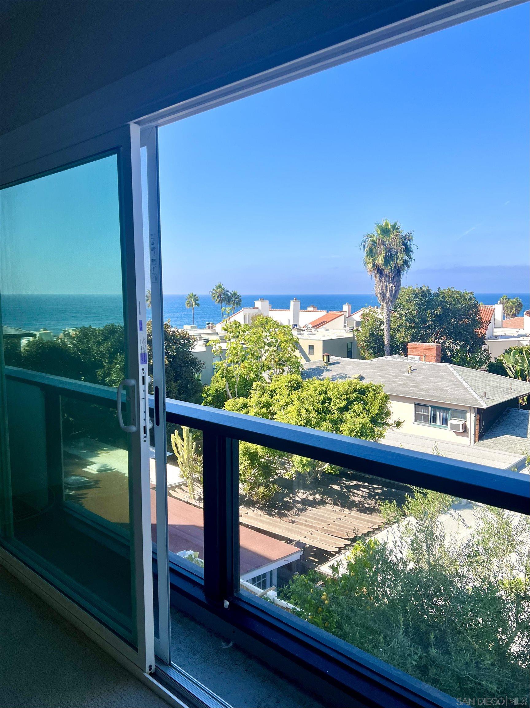 a view of a balcony with lake view