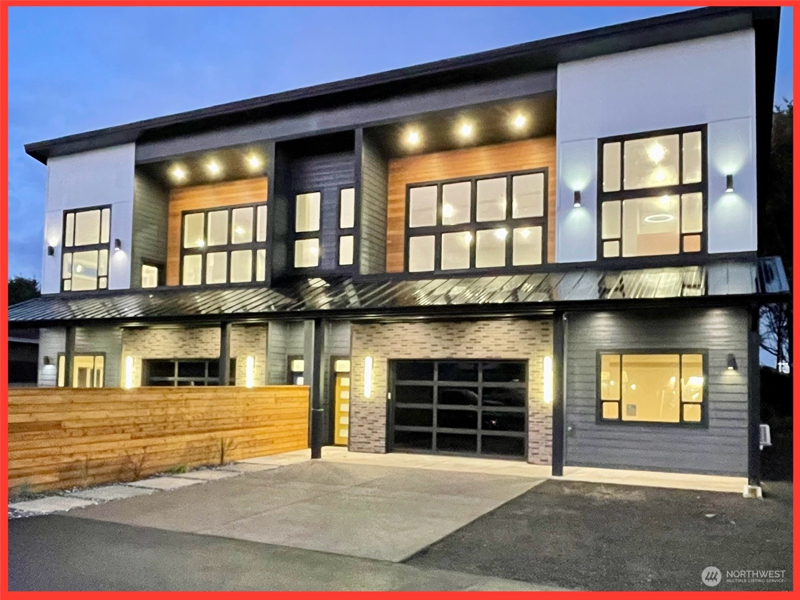 a front view of a house with a garage