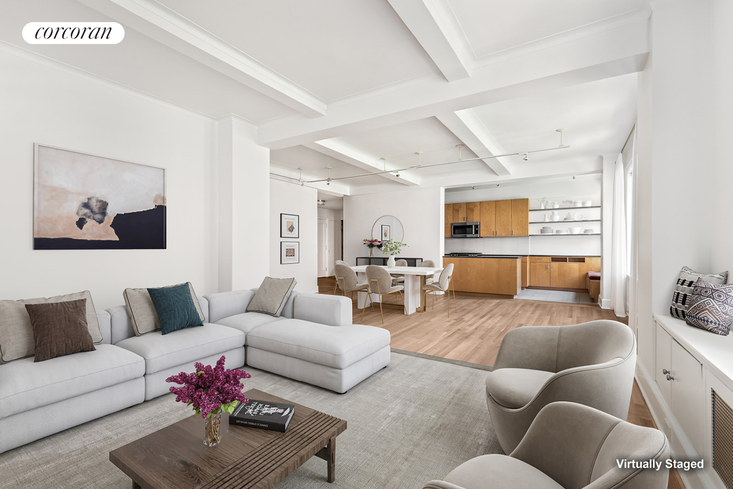 a living room with furniture or couch and a view of kitchen