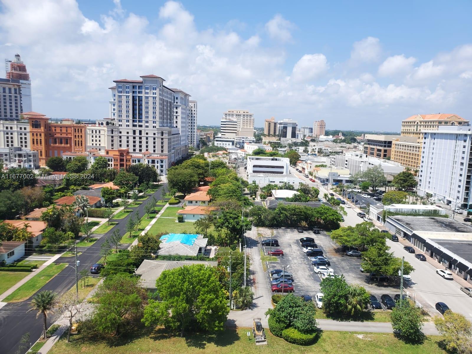 an aerial view of a city with lots of residential buildings