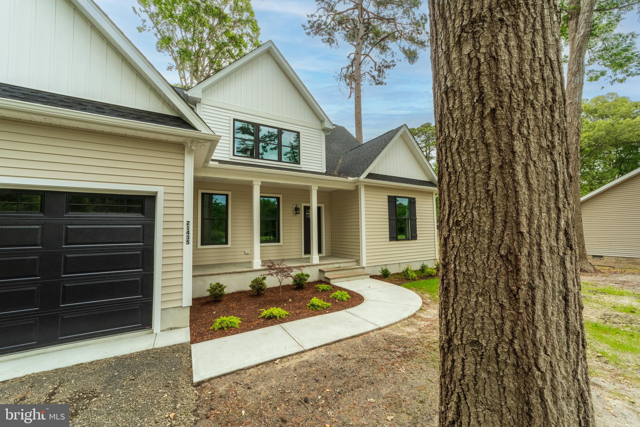 an outdoor view of house and front view of a house