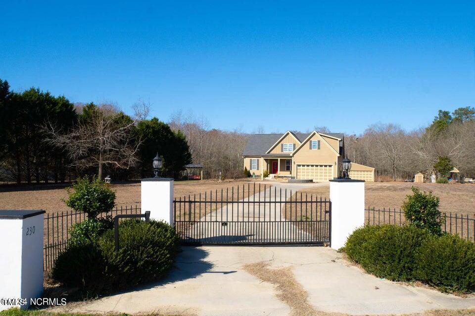 a view of a wrought iron fences in front of house