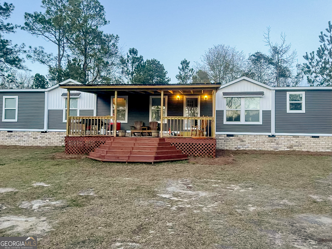 front view of a house with a patio