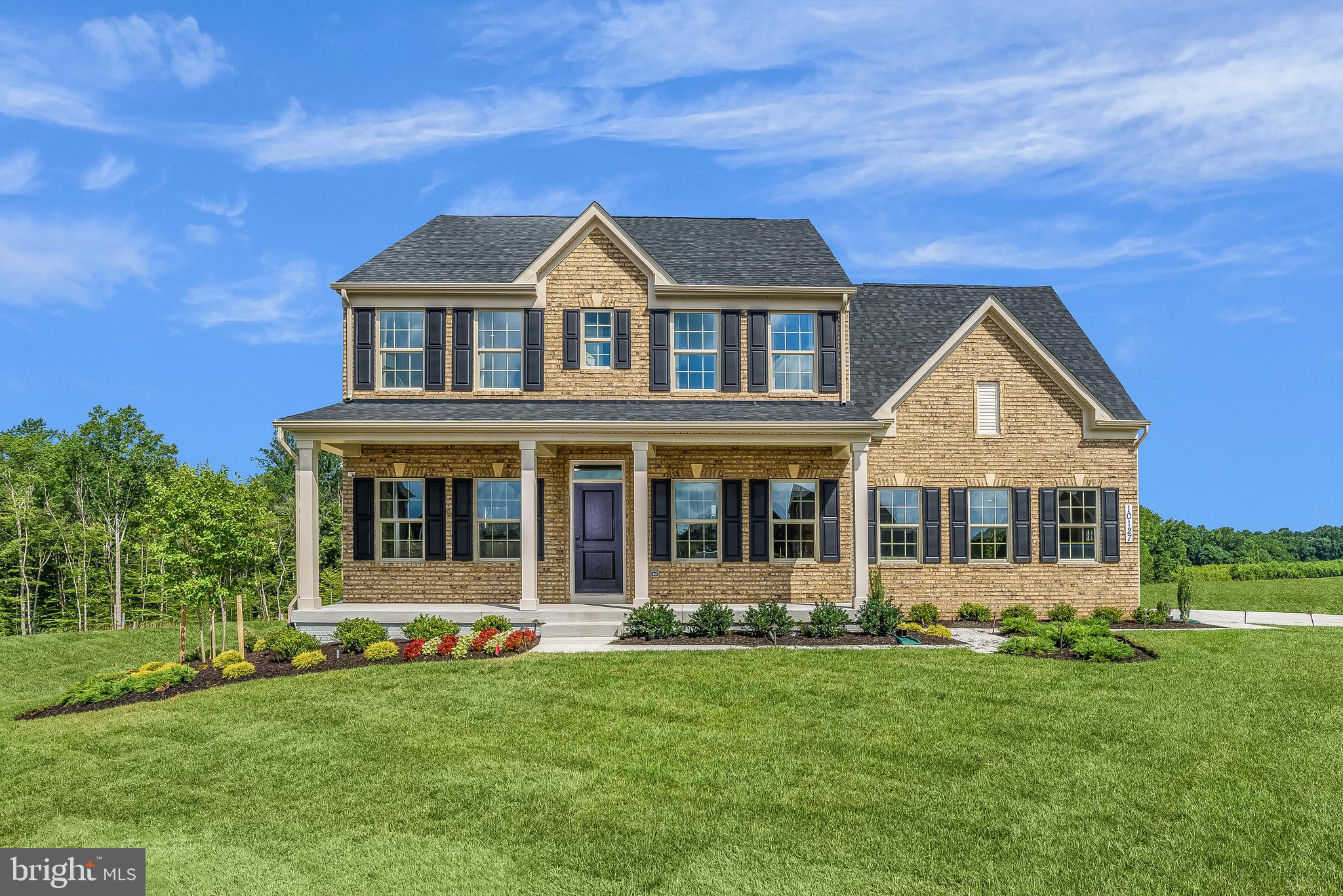 front view of house with a yard