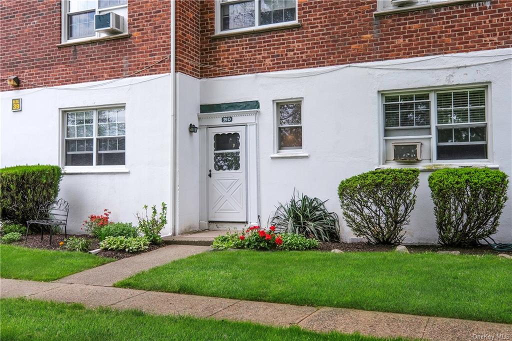 a view of a house with a garden