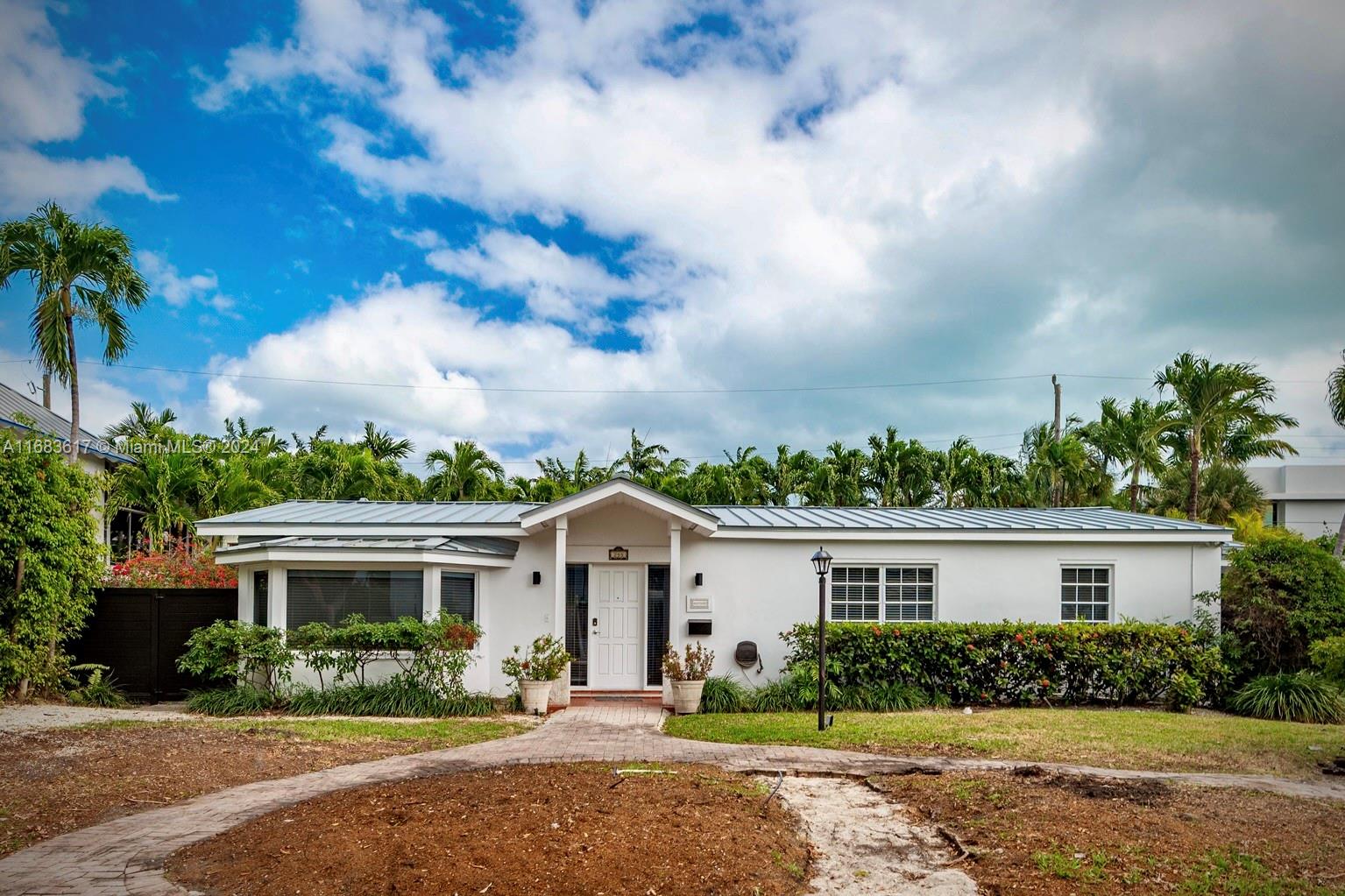 front view of house with a yard