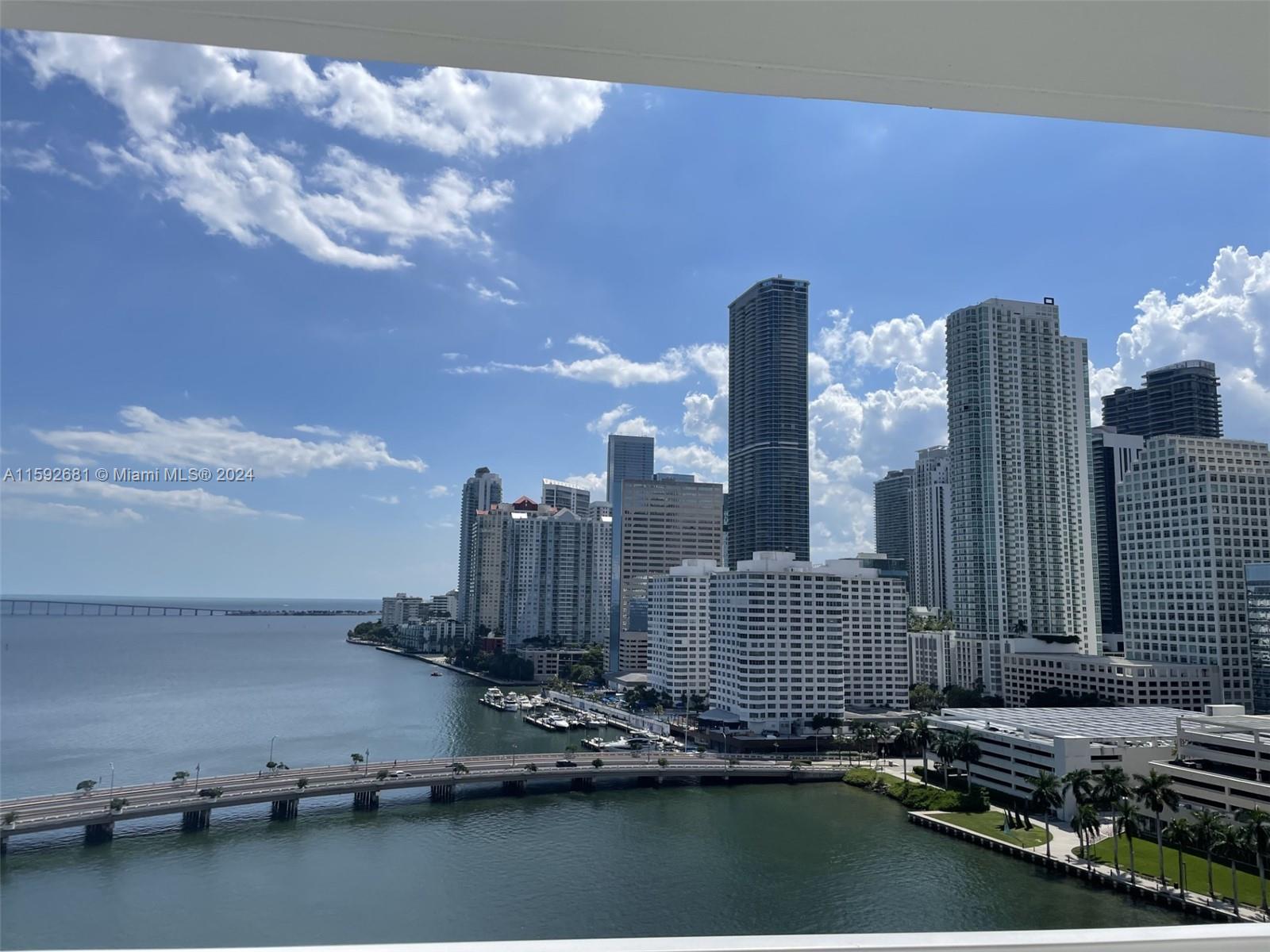 a view of a city with tall buildings