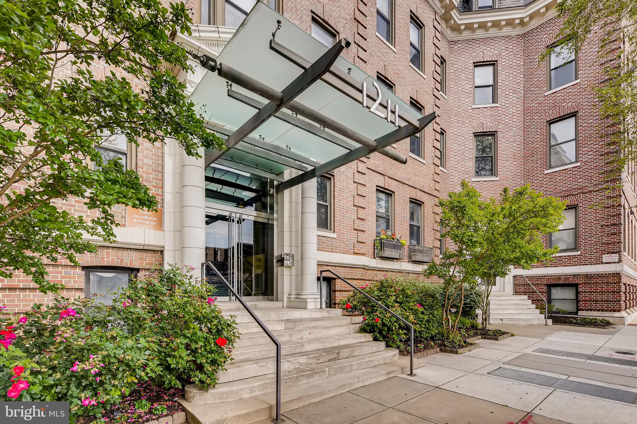 a view of a building with a garden