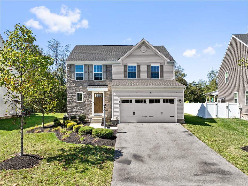 Welcome home to 3010 Highpoint Drive in South Fayette...