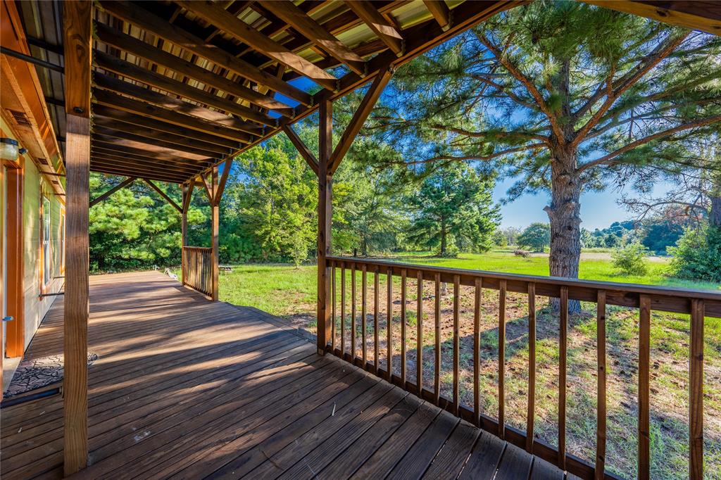 a view of porch with a swing