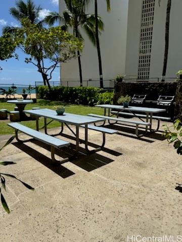 a view of swimming pool with outdoor seating