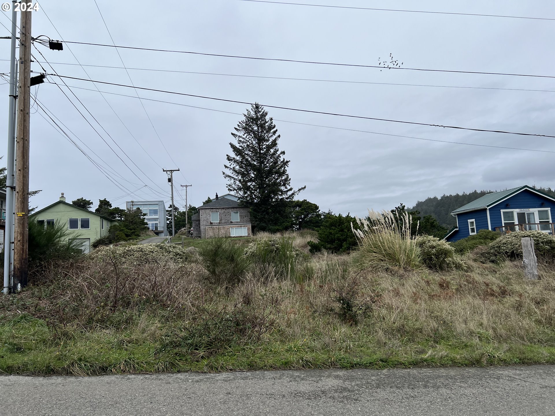 a view of a house with a street