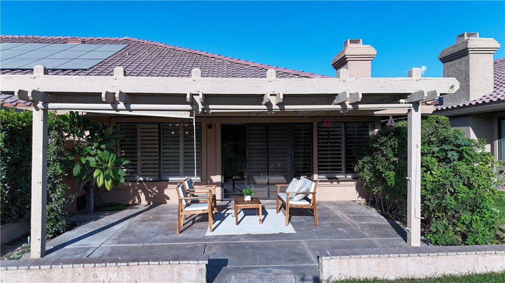 front view of a house with a patio