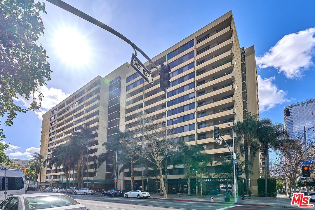 a view of a building with a street