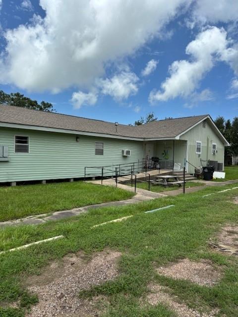 a front view of house with yard and entertaining space