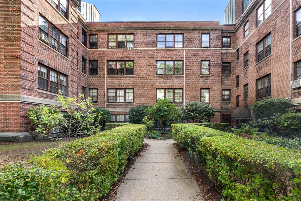 a view of a building with garden