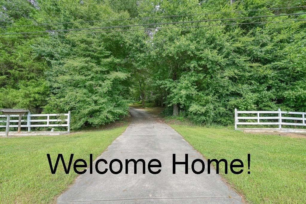 a view of a park with welcome board