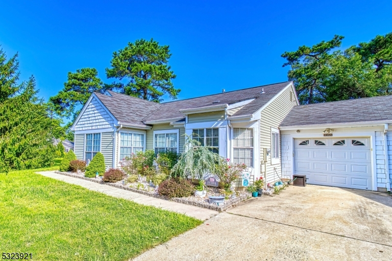 a house view with a garden space