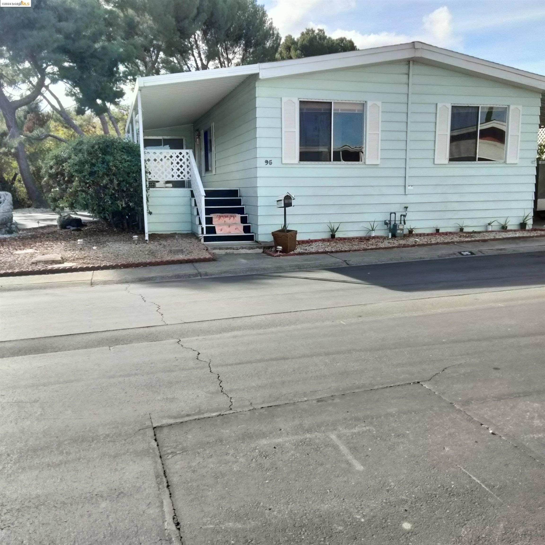 a front view of house with yard