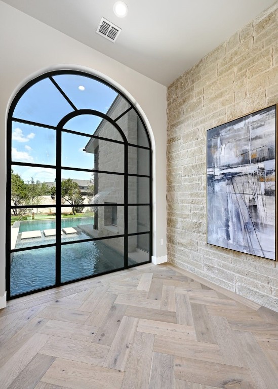 a view of staircase with a large window