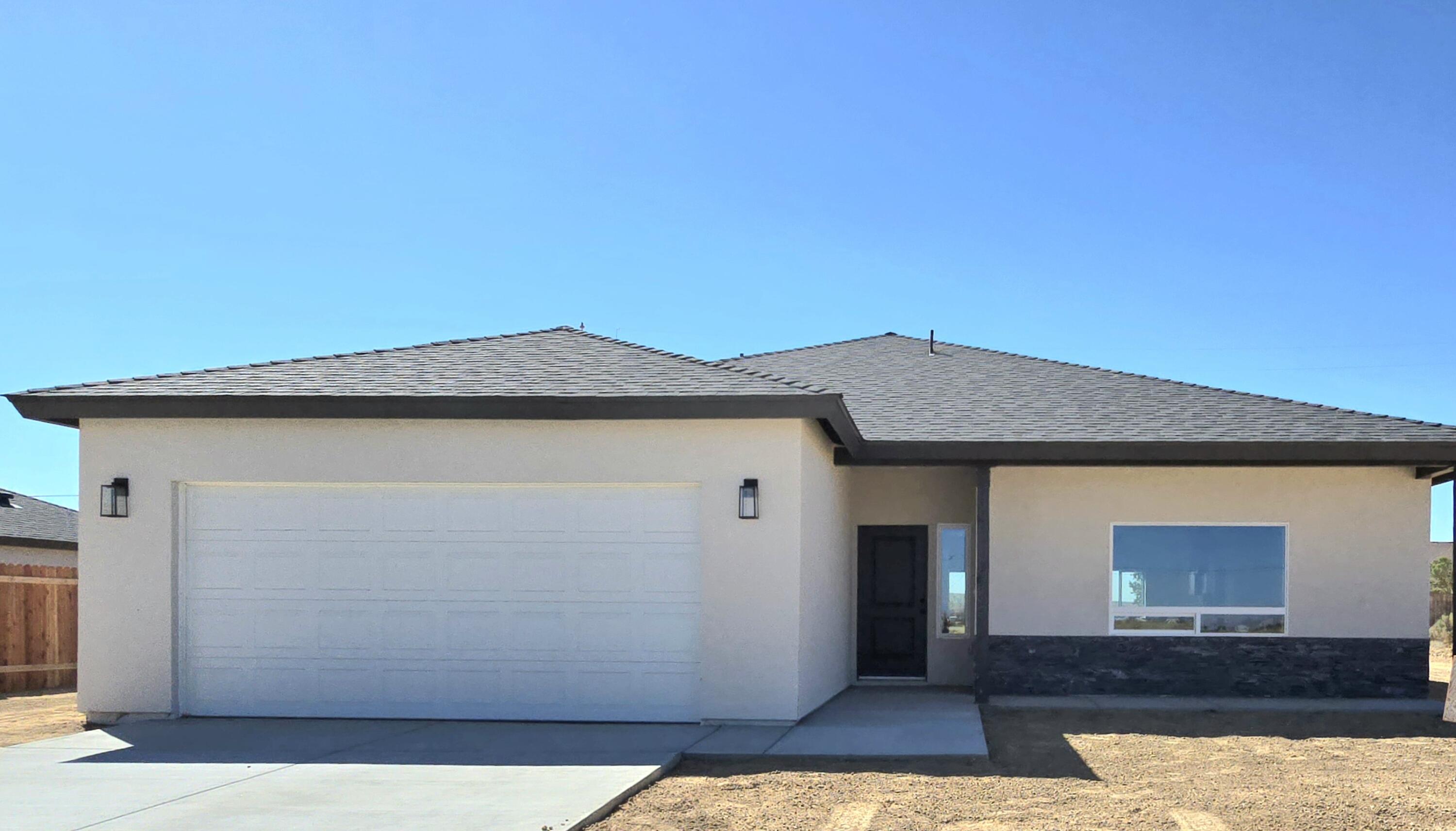 a view of a house with a garage