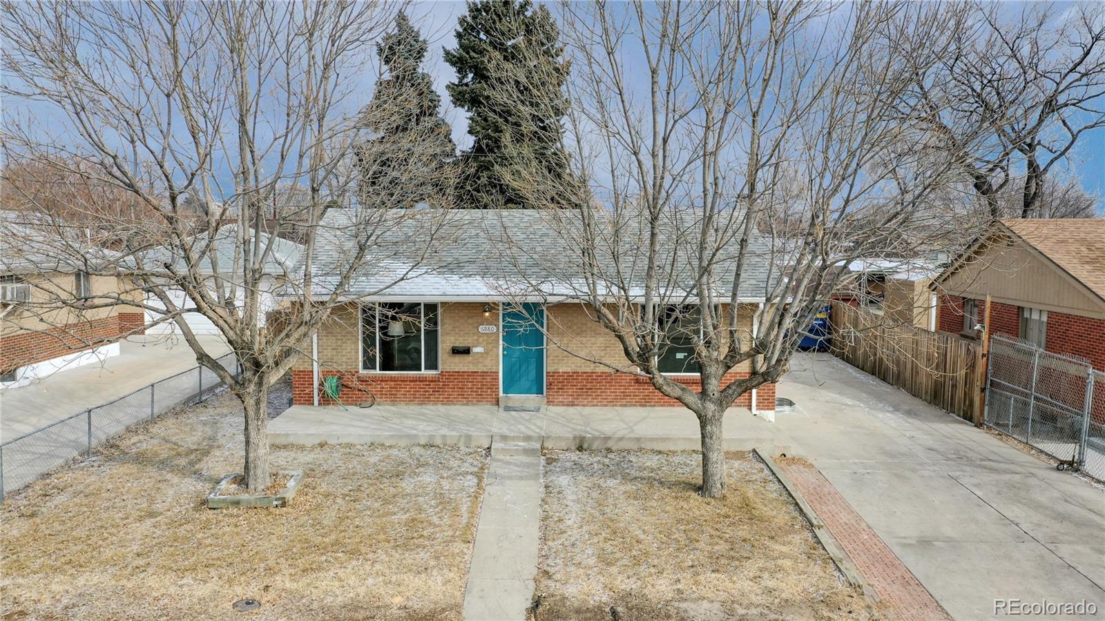 a view of a house with a snow