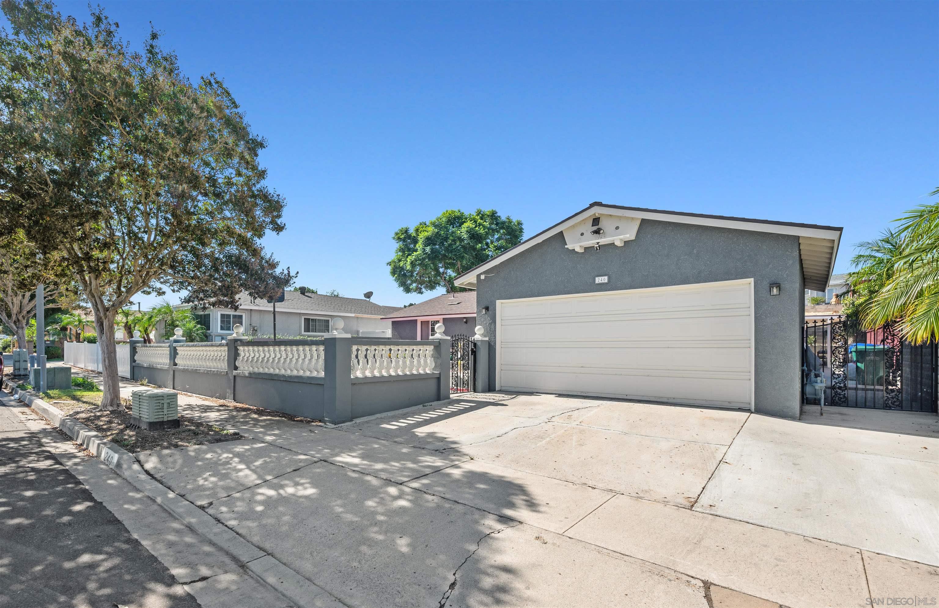 a front view of a house with a garage