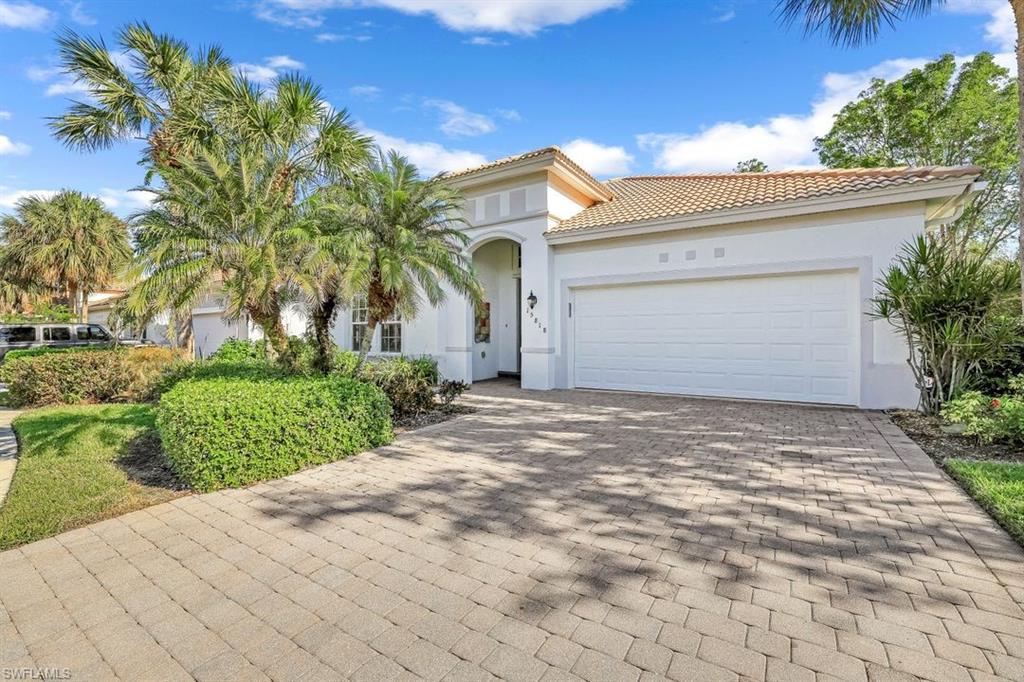 Mediterranean / spanish-style home featuring a garage