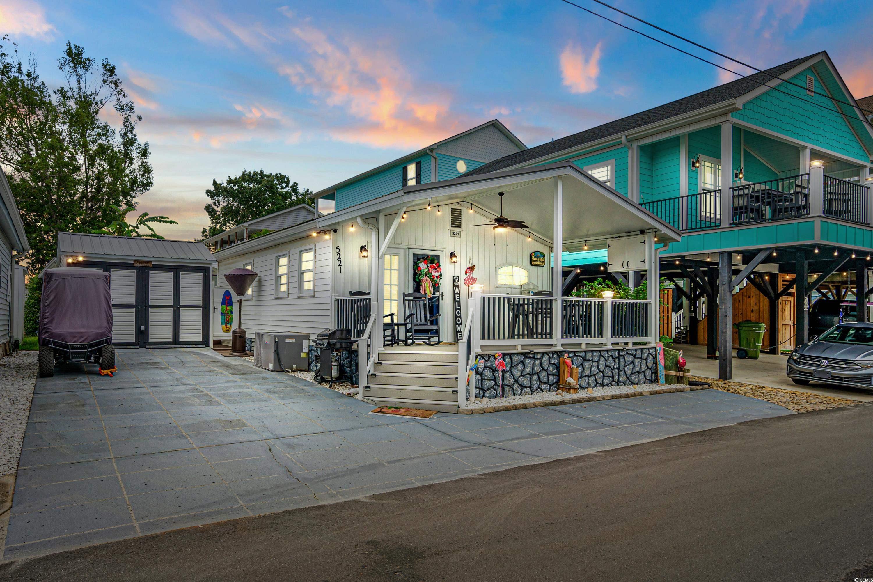 View of front of house with an outdoor structure