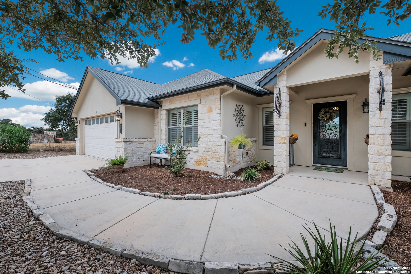 a front view of a house with entertaining space