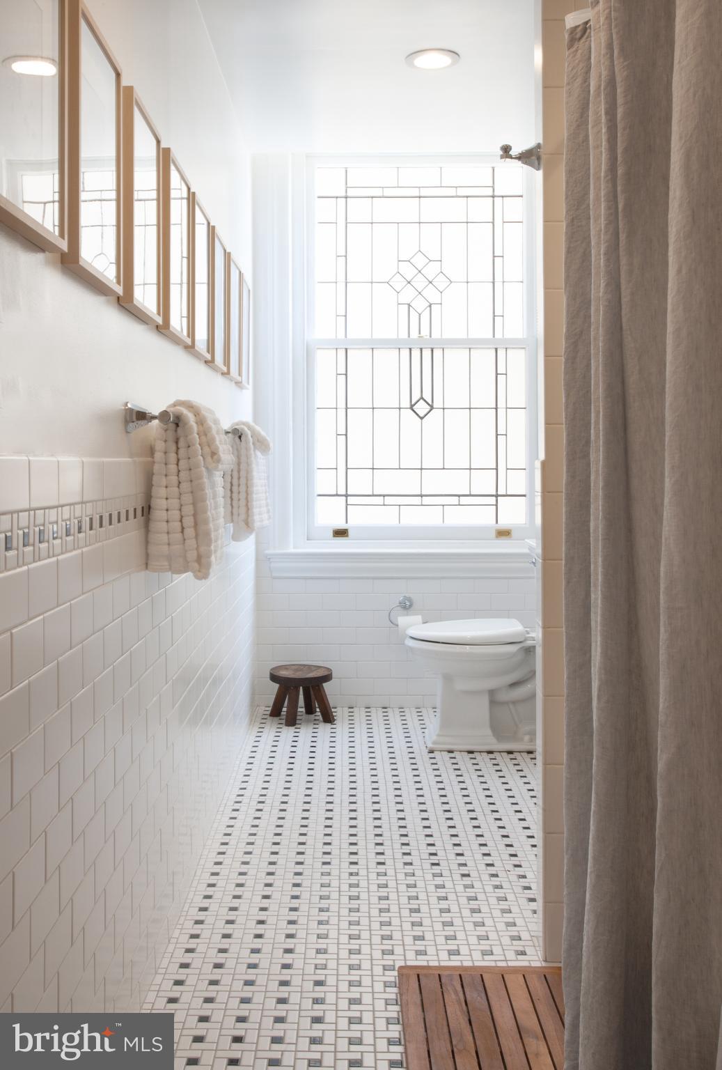 a bathroom with a sink and a bathtub