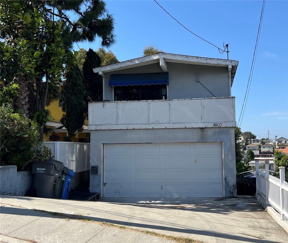 a view of a house with a garage