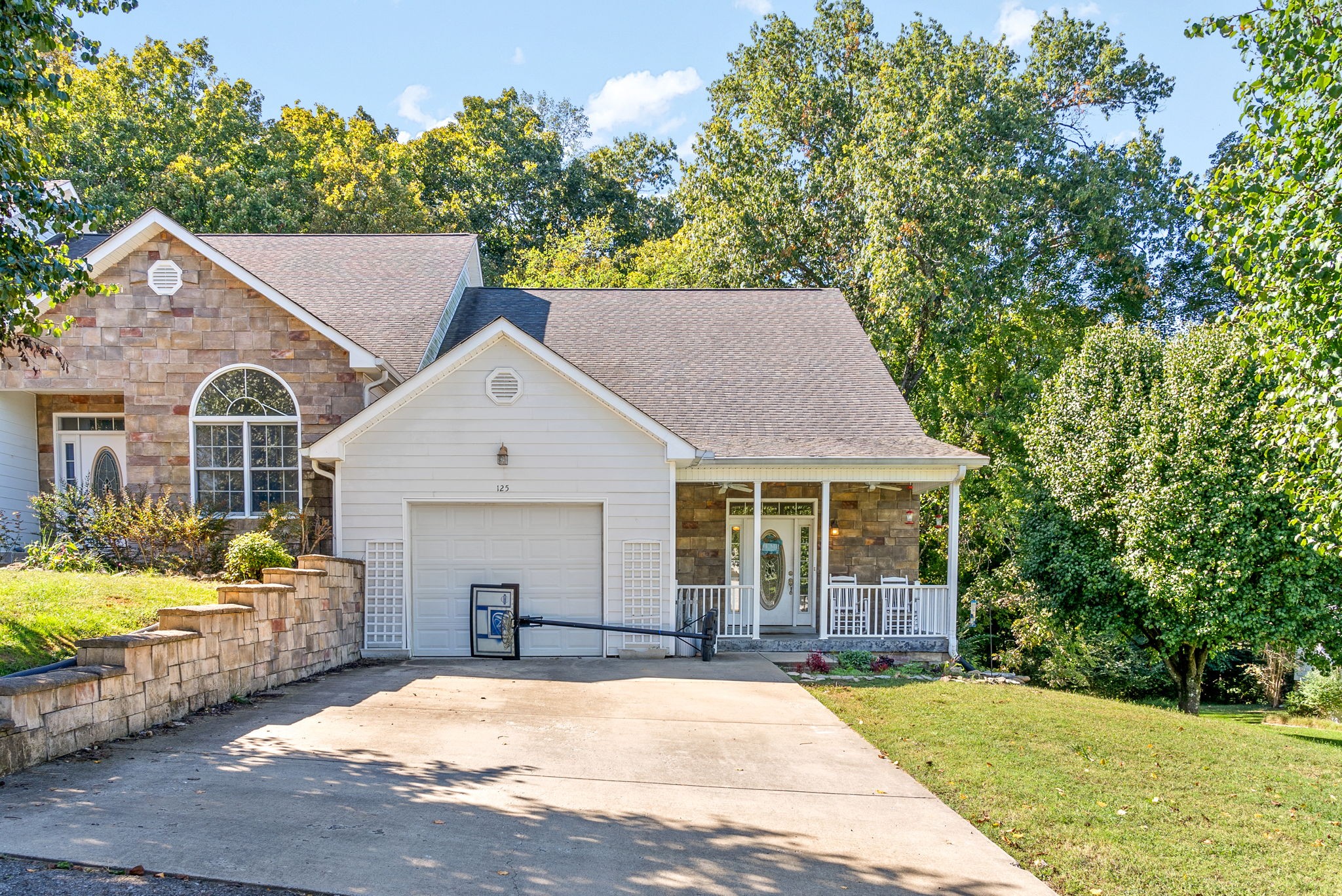 a view of house with yard outdoor seating and entertaining space